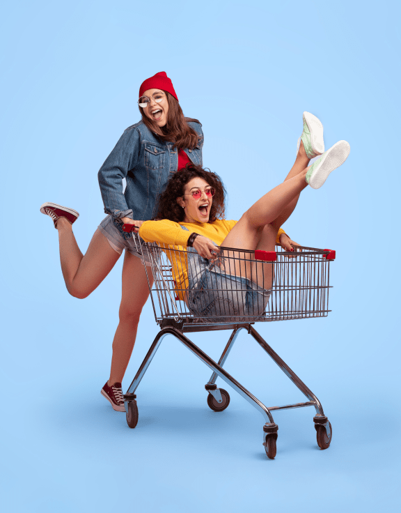 Women shopping with a shopping trolly