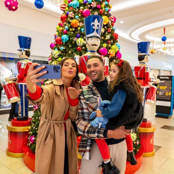 Family Enjoying Christmas Decorations inside Eldon Square Shopping Centre